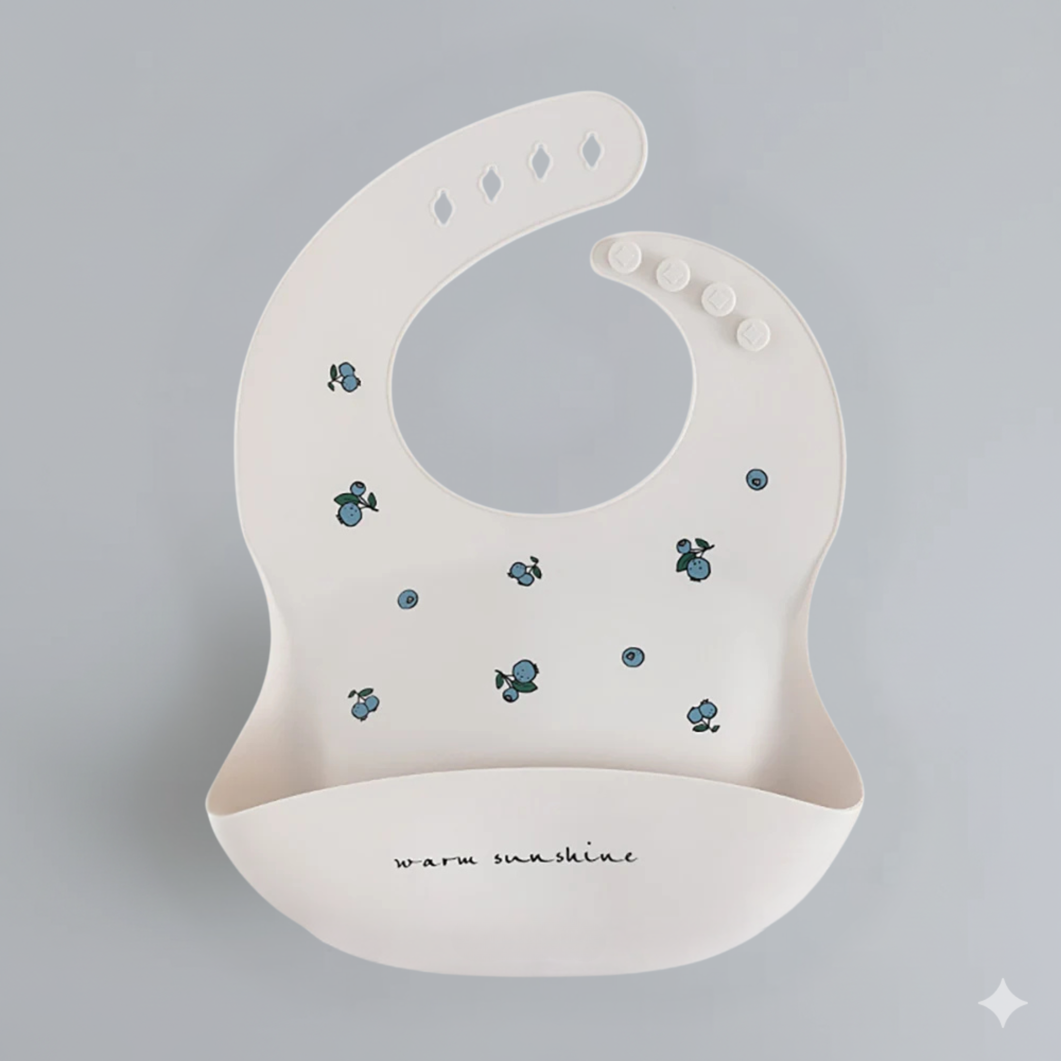 Bavoir à motifs avec récupérateur