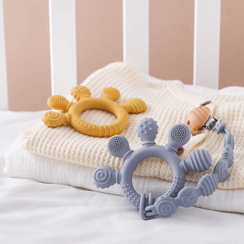 Pacifier clip with teething ring